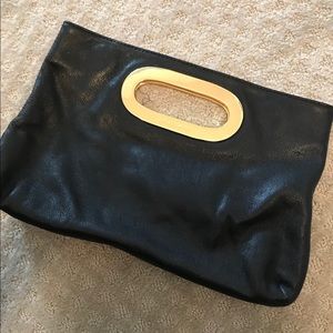 Black and Gold Michael Kors clutch